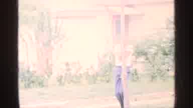 Florida (1959): Adult Man Standing Outside Of House With Baby