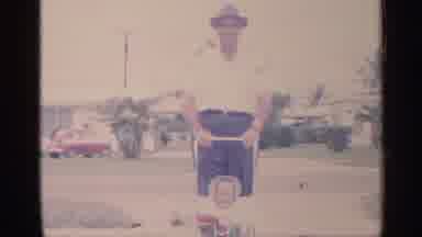 Florida (1959): Man Pushes A Stroller On Sidewalk