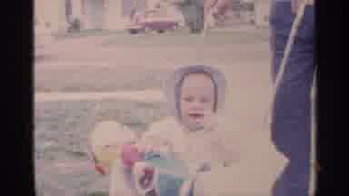 Florida (1959): Baby Child Wearing Blue Ht Being Varied By Adult Male