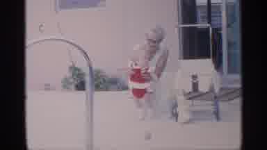 Florida (1959): Lady Who Is Carrying Baby Holding Yellow Rb Bit