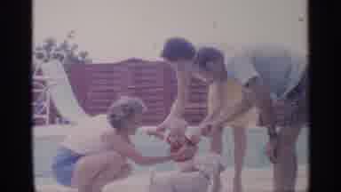 Florida (1959): Two Women And One Man Awn Over Baby Dressed In Red And Excited