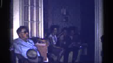 Florida (1959): Men And Women Sitting And Talking Inside Of House