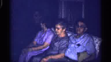 Florida (1959): Three People Wearing Glasses Sit On White Of Talking And Laughing