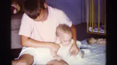 Florida (1959): Boy Plays With A Girl Toddler On Flo Other Of By's Room