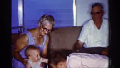 Florida (1959): A Child Plays With His Brother While His Grandparents Are Watching