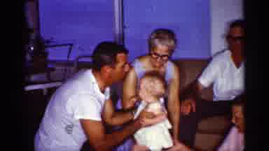 Florida (1959): Taking And Kissing Cute Little Baby Girl On His Ends