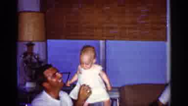 Florida (1959): Dad Holding Daughter While Son Goes Up And Tickles Her
