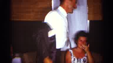 Florida (1959): Man Wearing White Shirt Ekes Off Suit Jacket To Sit Down