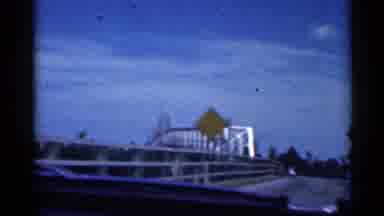 Indiana (1959): View Father On Inside Of Car Driving Cross Bridge With Car Passing