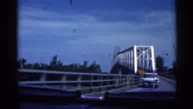 Indiana (1959): Cars Pass Each Other Traveling In Opposite Recantations One Steel