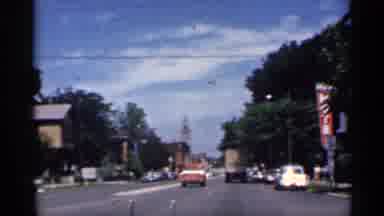 Indiana (1959): Car Drives Behind A Truck And A Car
