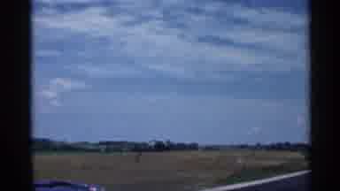 Indiana (1959): Driving Down Rod And Passing Cars On Bright Sunny Day