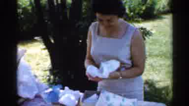 Indiana (1959): Women Opening Gifts During Celebratory Time And Hippy