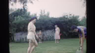 Indiana (1959): People Playing Badminton In Yard