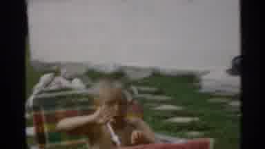 Indiana (1959): Family In Backyard Playing Tunis And Boy Sitting In Chair Eating