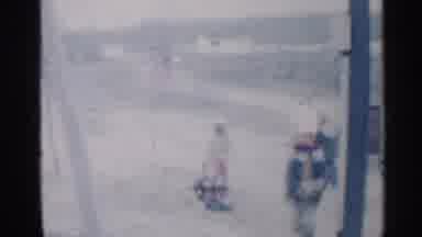 Indiana (1959): Children Wearing Winter Cl's Digging In Snow And Throwing