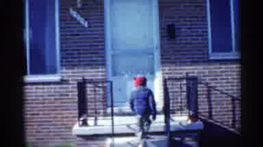 Indiana (1959): Child Walking Up Stairs To Pothers A Sitting On Railing