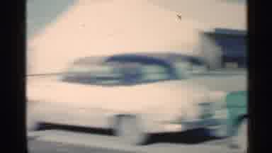 Indiana (1959): Two Irked Cars And People Derby And Black Dog