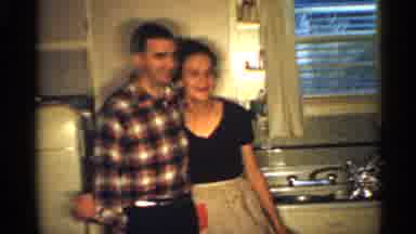 Indiana (1959): Women Wearing Black Dress White Preparing Food In Kitchen Hugs