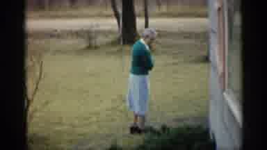 Indiana (1959): Woman Walking Around Outside Of House One Rod