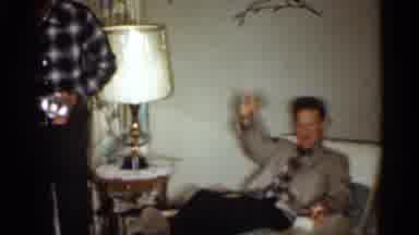 Dads are in merry mode when the couch is their throne!