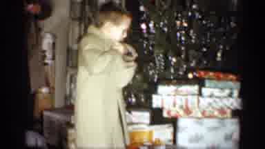 Indiana (1959): Little Boy Being Very Excited At Christmas To Try On His New Cl's