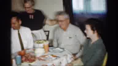 Indiana (1959): Older Woman Wearing Black Dress With White Pron Putting Two Men On