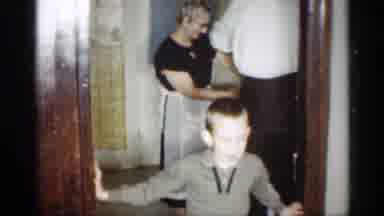 Indiana (1959): Kid Goofing Round To Comer S People Behind Him Do Something
