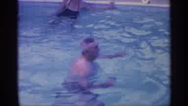 Indiana (1959): Man And Woman In Pool Water Daytime Outdo Others Outside Sunny