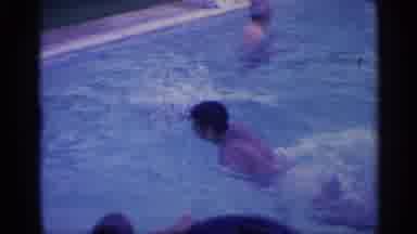 Indiana (1959): Man Swimming In Swimming Pool During Family Party