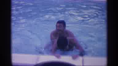 Indiana (1959): Father Pulling Other Father Back Into Pool To Keep Swimming