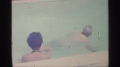 Indiana (1959): Two Adults And Child In Swimming Pool Child Using Inner Tube