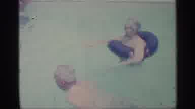 Indiana (1959): Adult Woman In Pool Flo While Men Swim Round Her