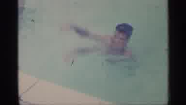 Indiana (1959): People Swimming In Pool And Jumping In