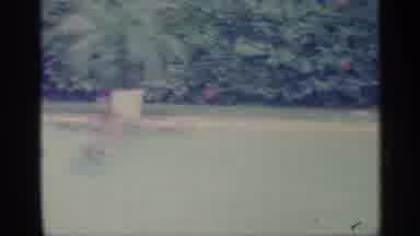 Indiana (1959): Three Men Are In Pool One Is Swimming One Standing And One Holding