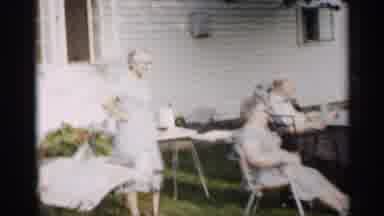 Indiana (1959): People Sitting In Lawn Chris Talking On Cleo Day