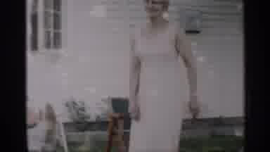 Indiana (1959): Hippy Adult Woman Playfully Dancing Outside Of House