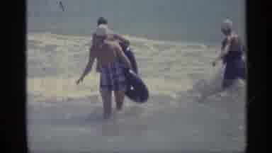 Indiana (1959): A Family Gathering In Beach With Their Floaters