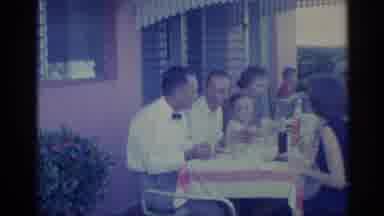 Indiana (1959): Group Of People Enjoying Air Weekend Lunch Together Outside