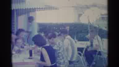 Indiana (1959): Ring Of Men Women And Children Eating And Drinking Outdo Others