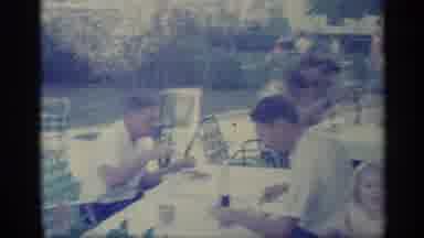 Indiana (1959): Men And Women Sitting Outside At Table Eating Together