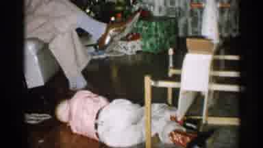 Michigan (1959): Little Boy Trying To Capture I=His Eddy Attention By Lying On To