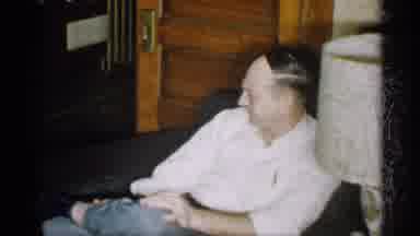 Michigan (1959): Person Sitting On Couch On Christmas Tree