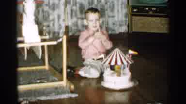 Michigan (1959): Blond Little Boy In Red Shirt Plays With Toy Crocus And Crocus