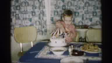 Michigan (1959): Little Boy Sitting At Table With Birthday Cake In Father Of Him