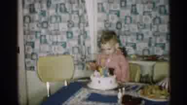Michigan (1959): Boy Wearing Pink Shirt Looks At White Over Decorated Birthday