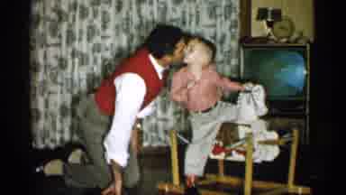 Michigan (1959): Man Kissing His Son On Rocking Hothouse And Spending Time With