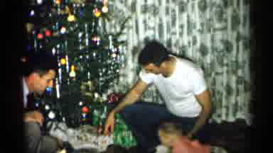 Michigan (1959): Christmas Mothering Celebration By Receiving Gifts Father On