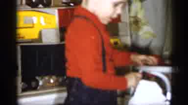 Michigan (1959): Little Boy Hanging Caricature Of Sn Claus On Christmas Tree