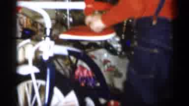 Michigan (1959): Little Boy Looking At Gifts Under Christmas Tree A Stands To Look